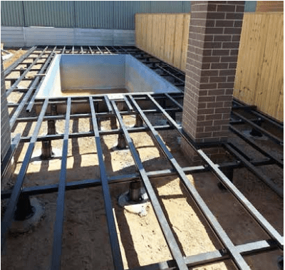 Clickdeck modular decking frame built next to a pool